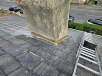 After — Repointed chimney with new lead flashing