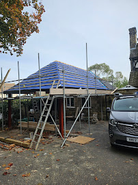 Before — Old worn roof on garage extension