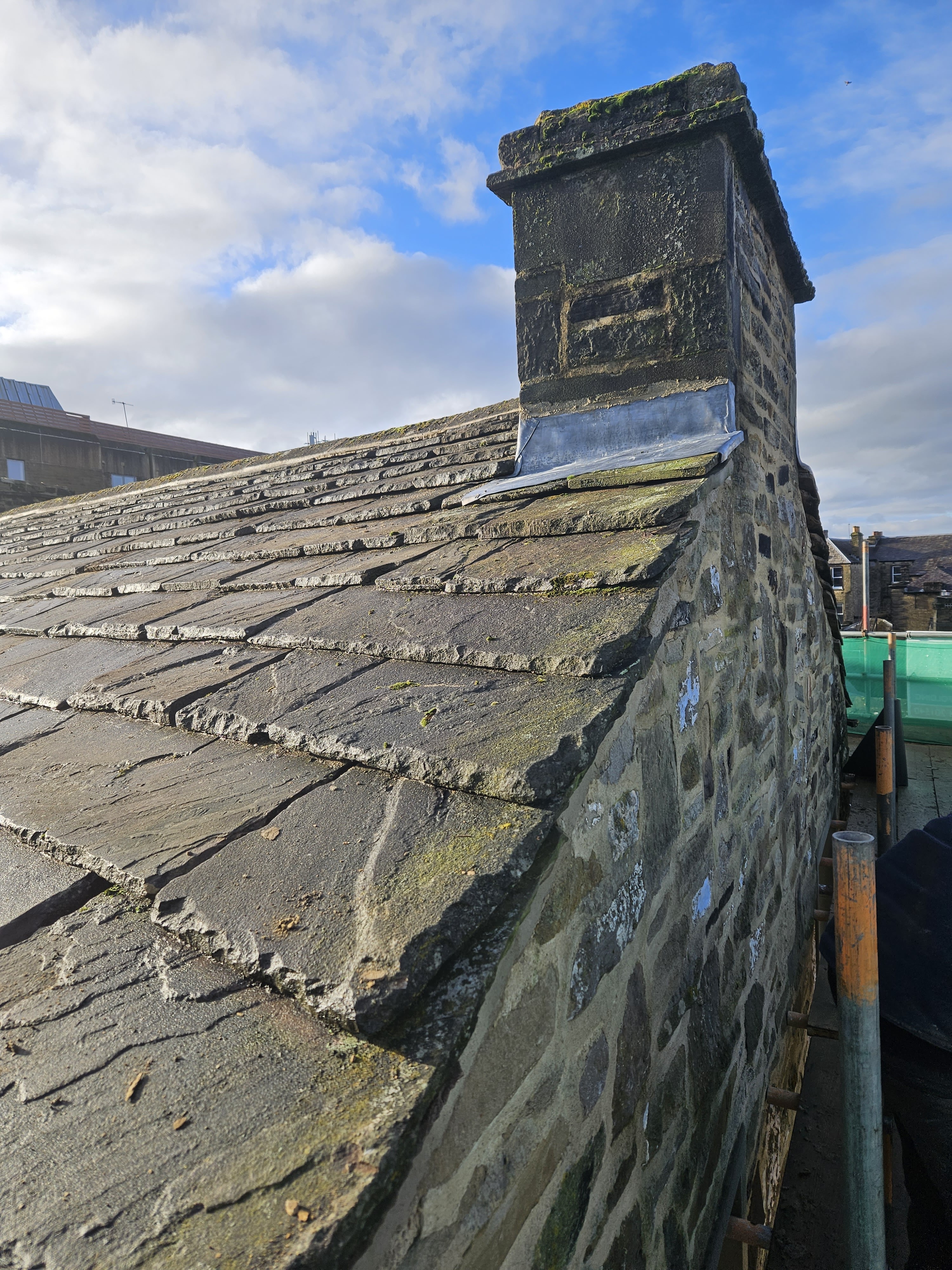 Leafield Roofing team working on a Yorkshire slate roof in Bradford