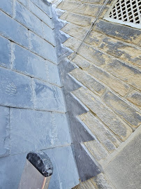 Professional Code-4 milled-lead flashing installation on a Bradford roof abutment — properly weathered into mortar by Leafield Roofing