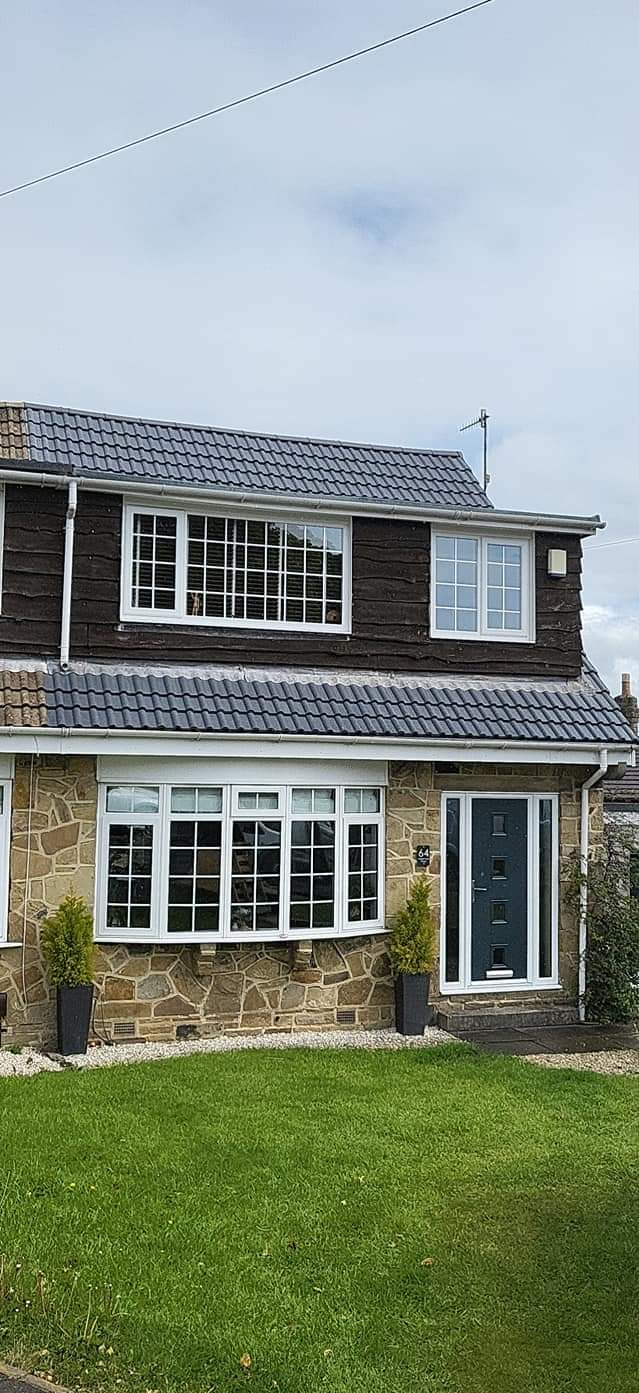 Bradford terrace with new grey slate roof installed by Leafield Roofing